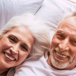 senior couple smiling at home